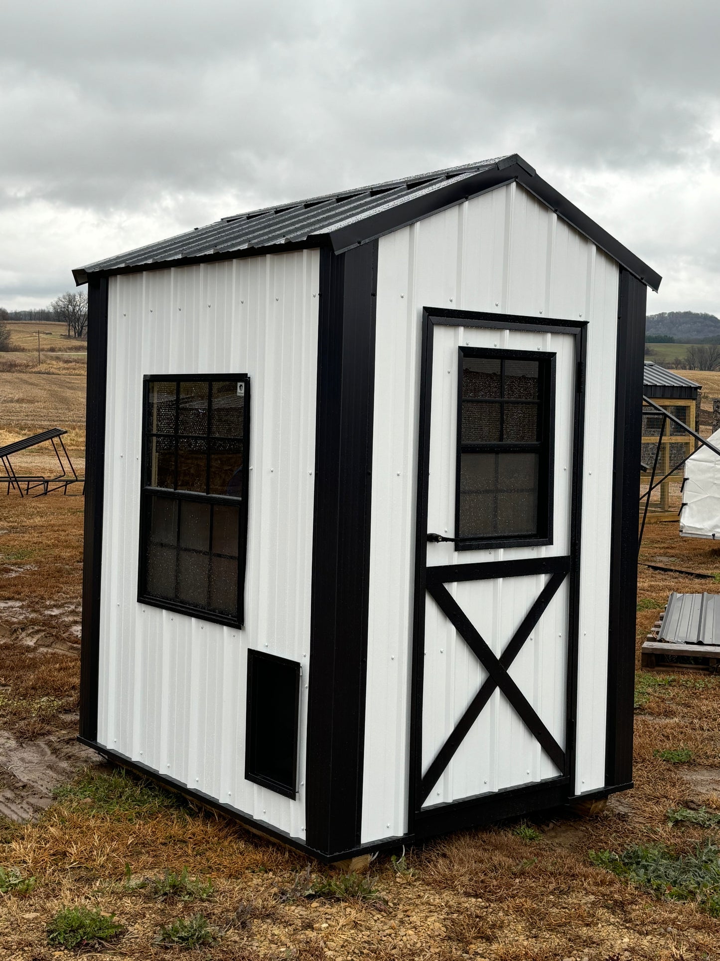 5’ x 6’ Country Coop in white and black. With wiring