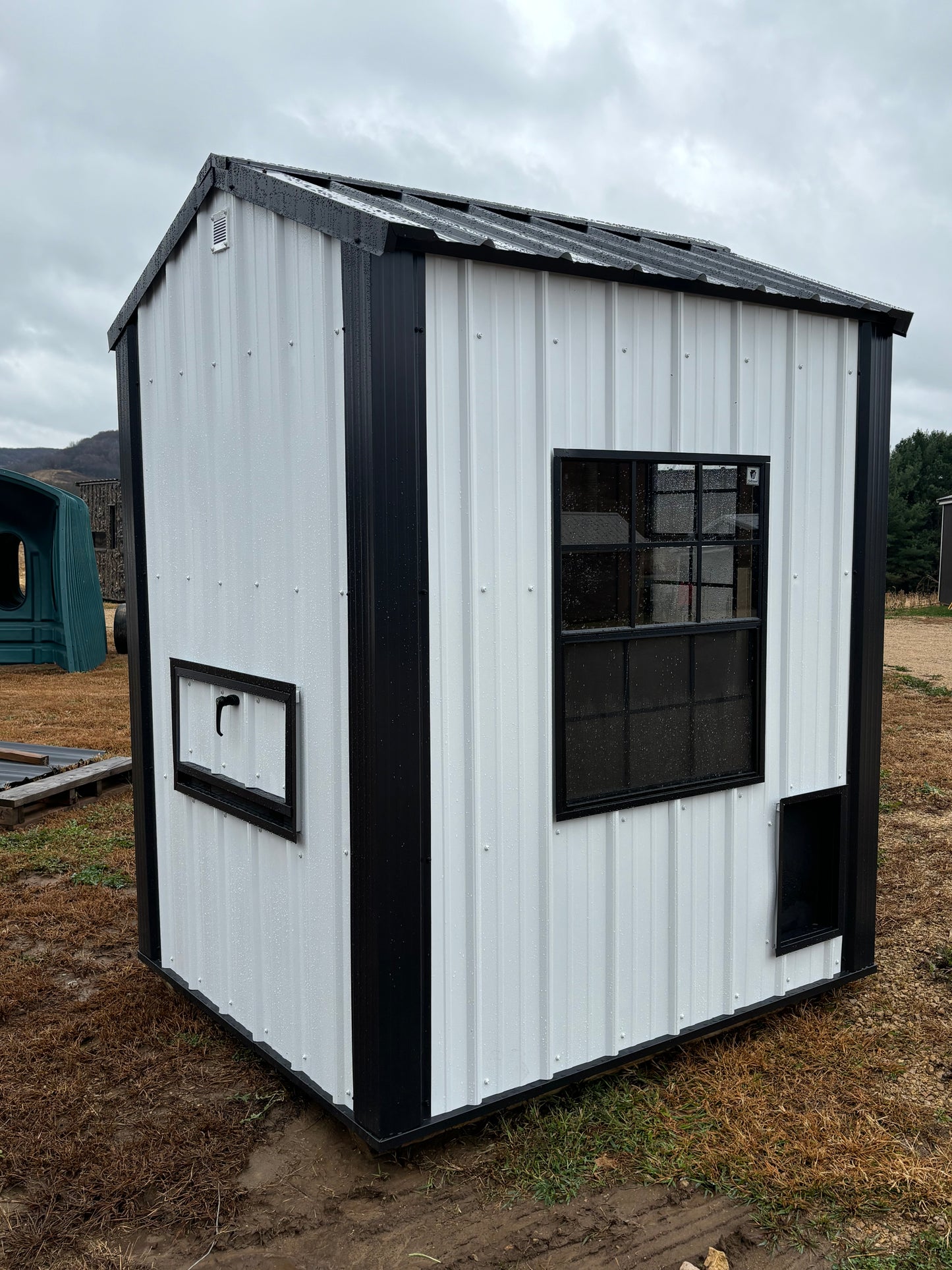 5’ x 6’ Country Coop in white and black. With wiring